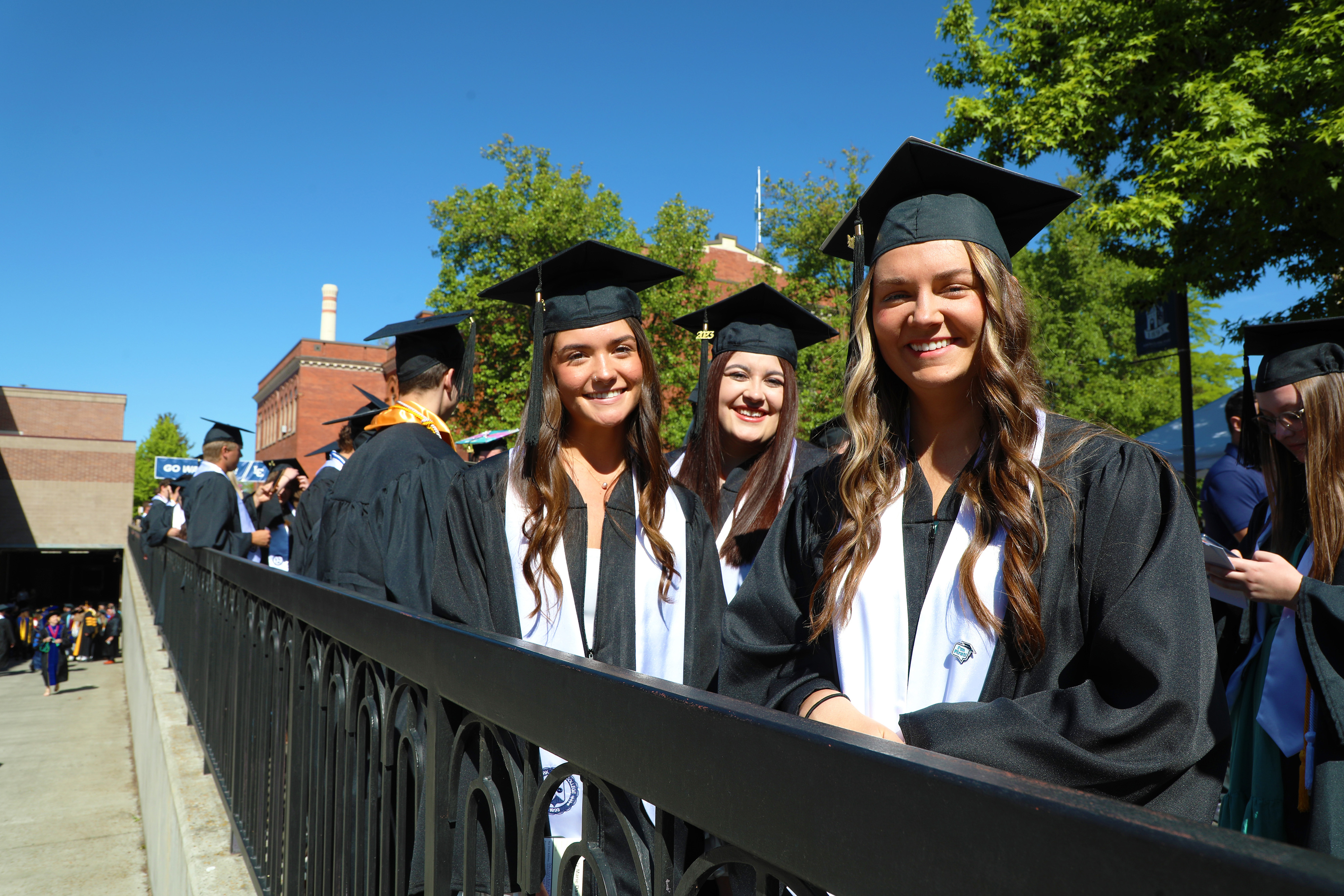 Three female 2024 graduates
