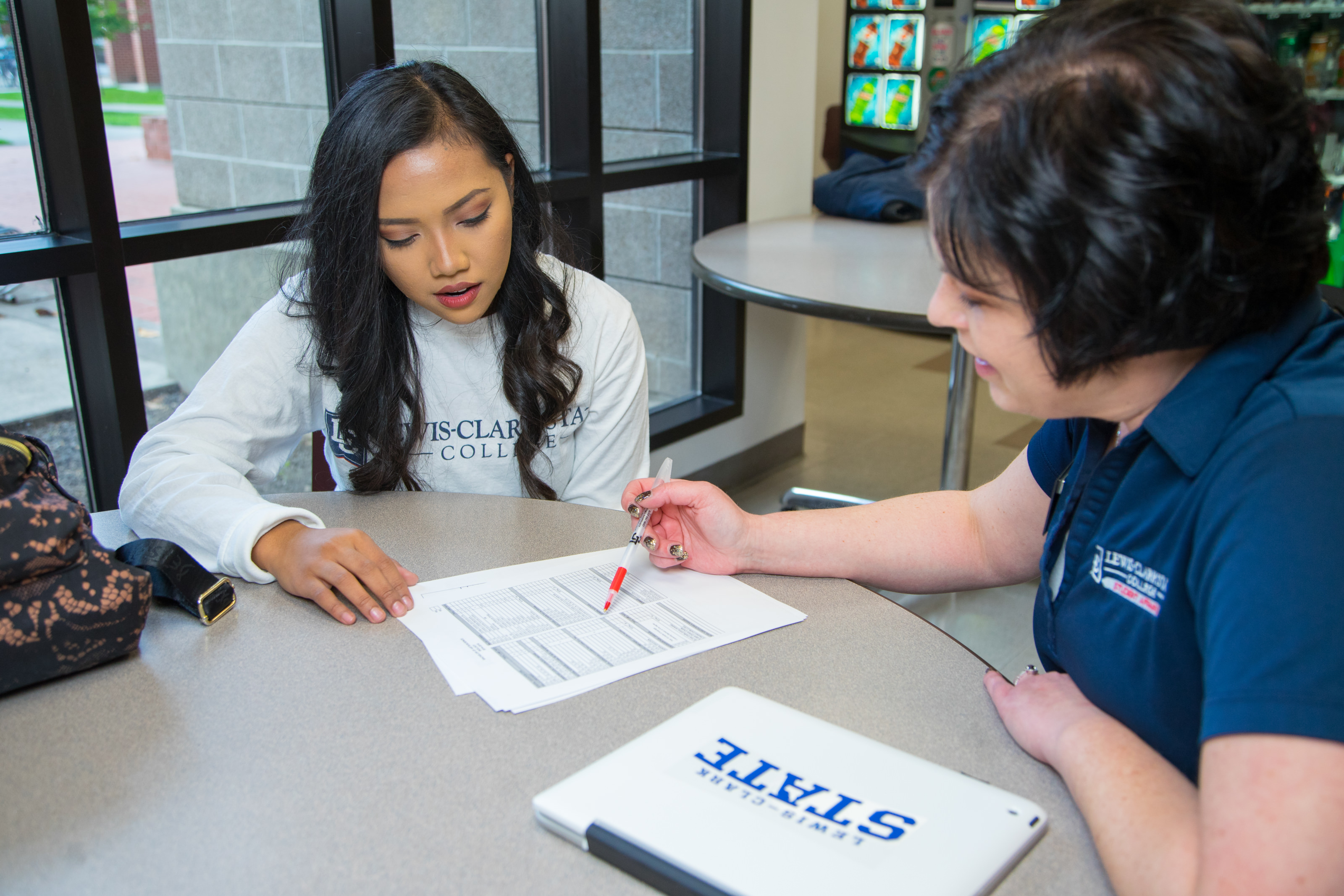 Student meeting with an advisor. 