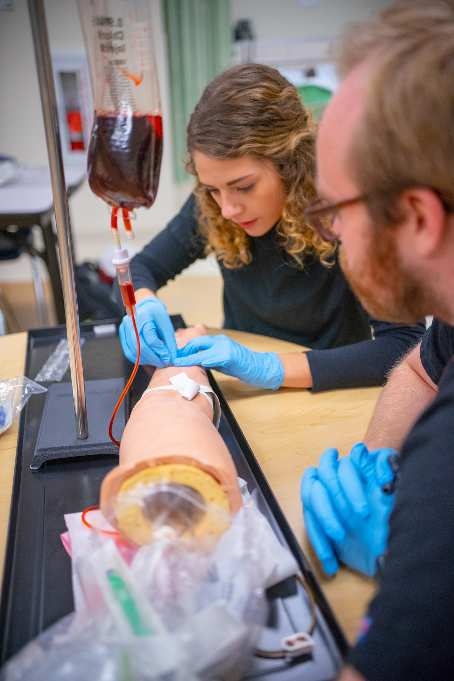 LC nursing students working on a dummy
