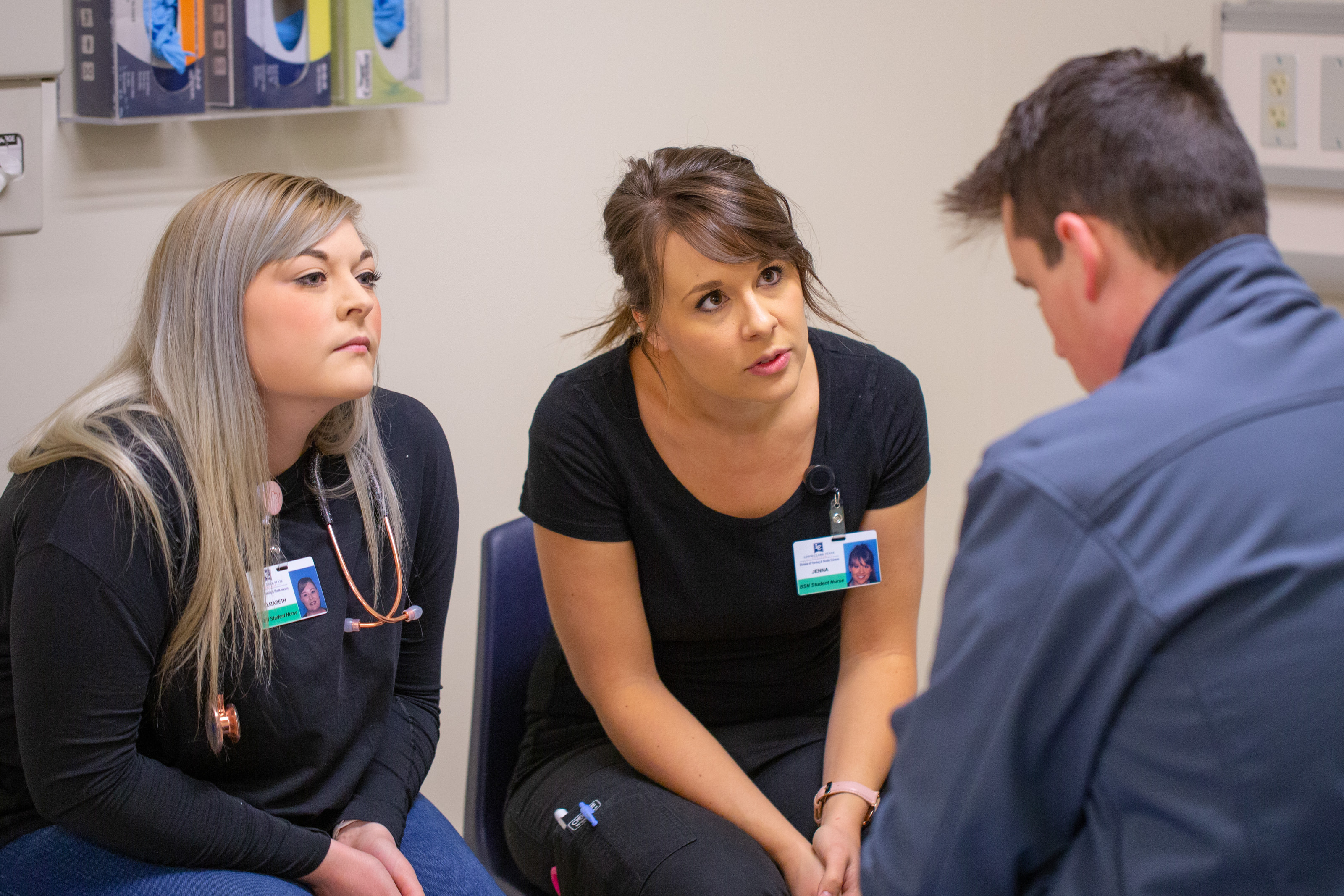 Students assessing patient