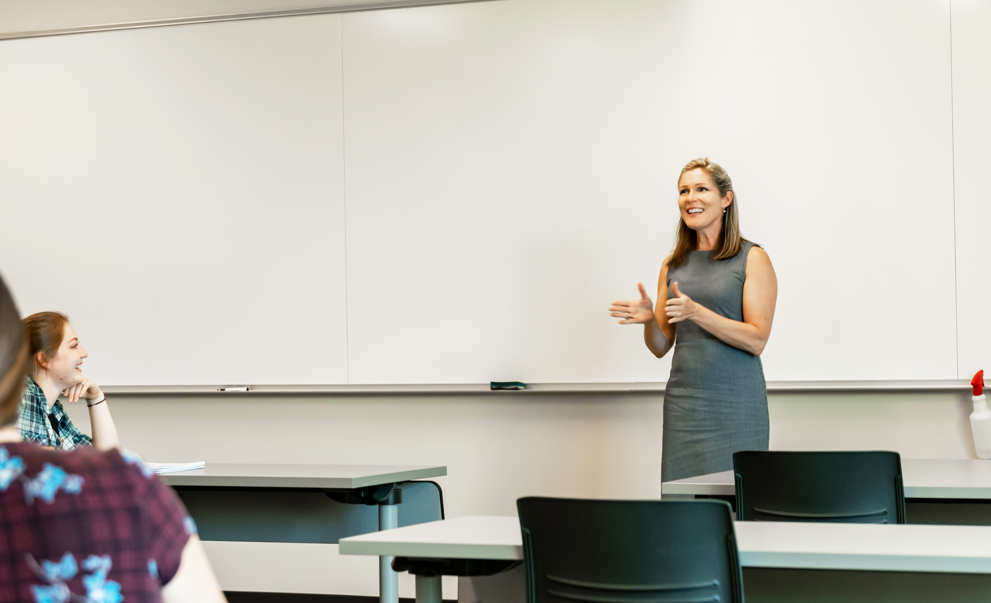 Female marketing professor teaching in classroom