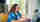 Female students at laptop in dorm