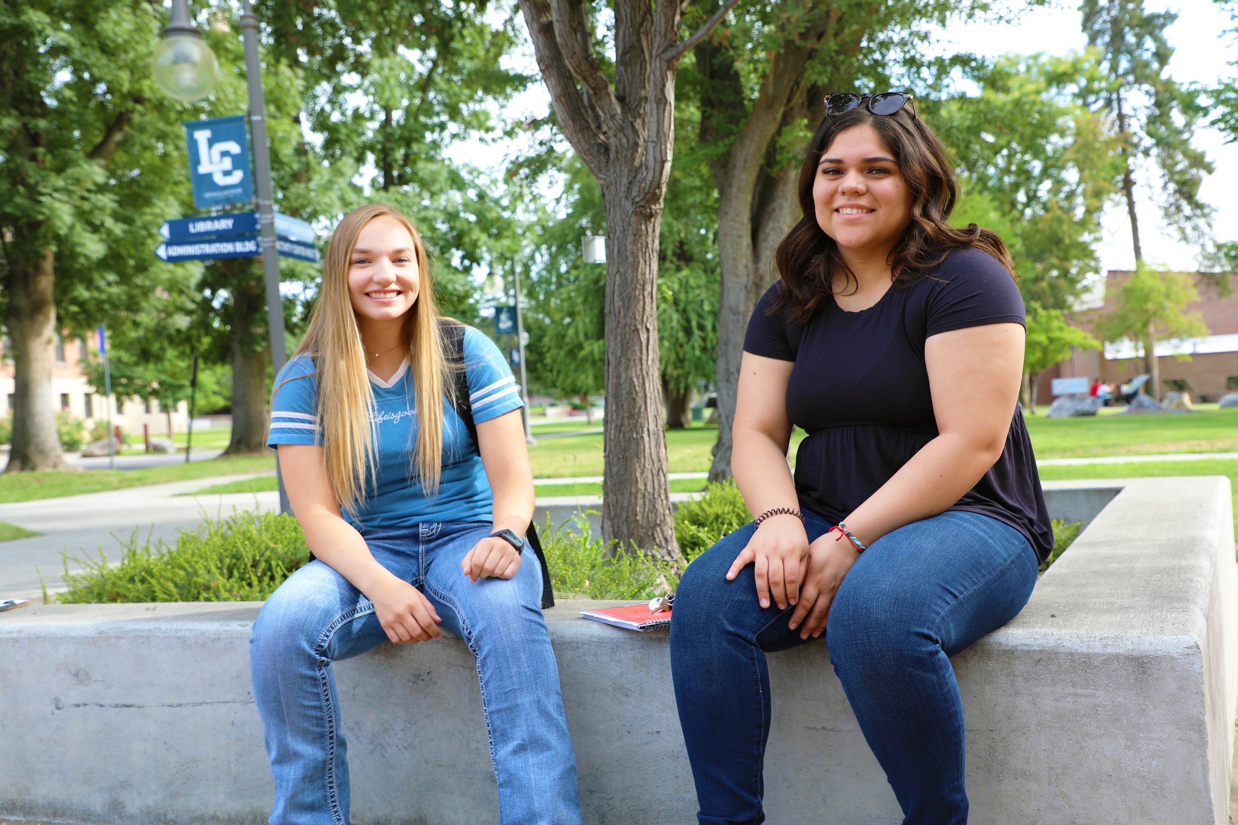 Students sitting on a bench
