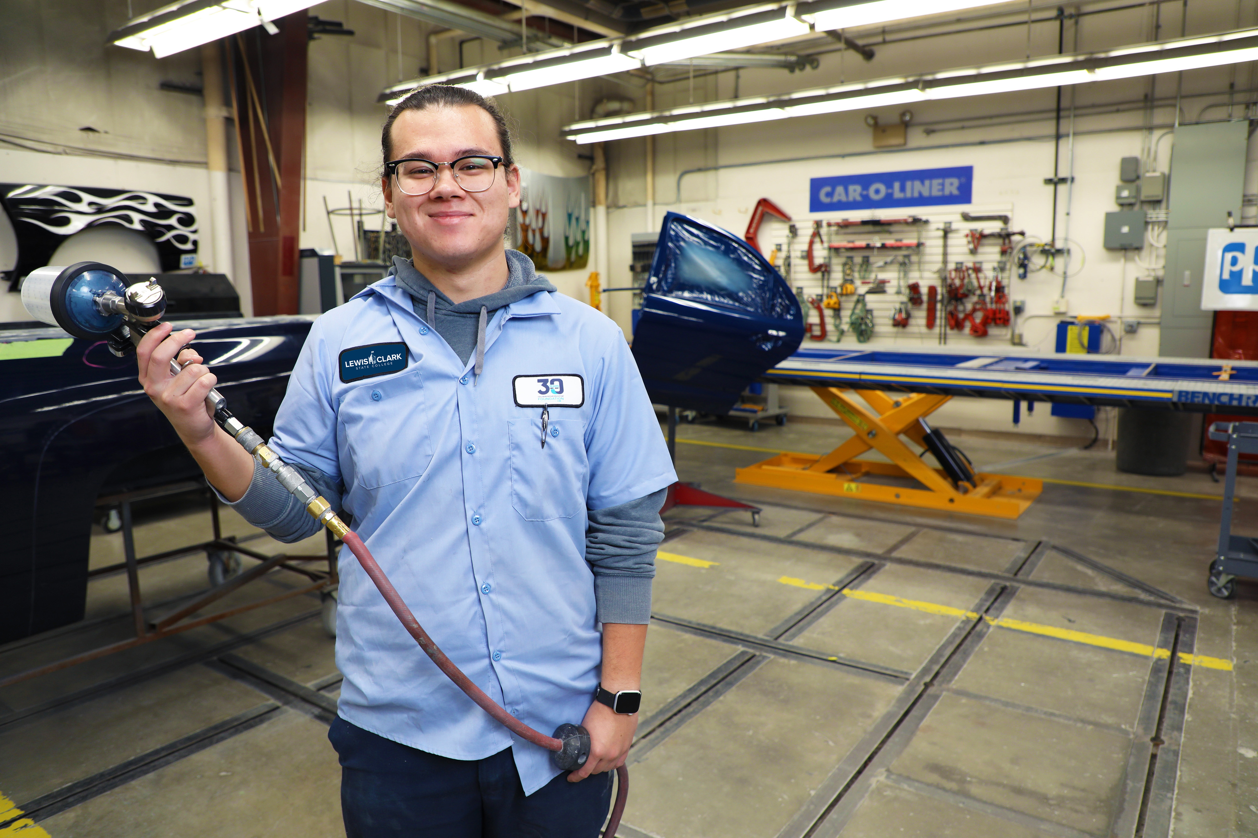 Male student with paint gun