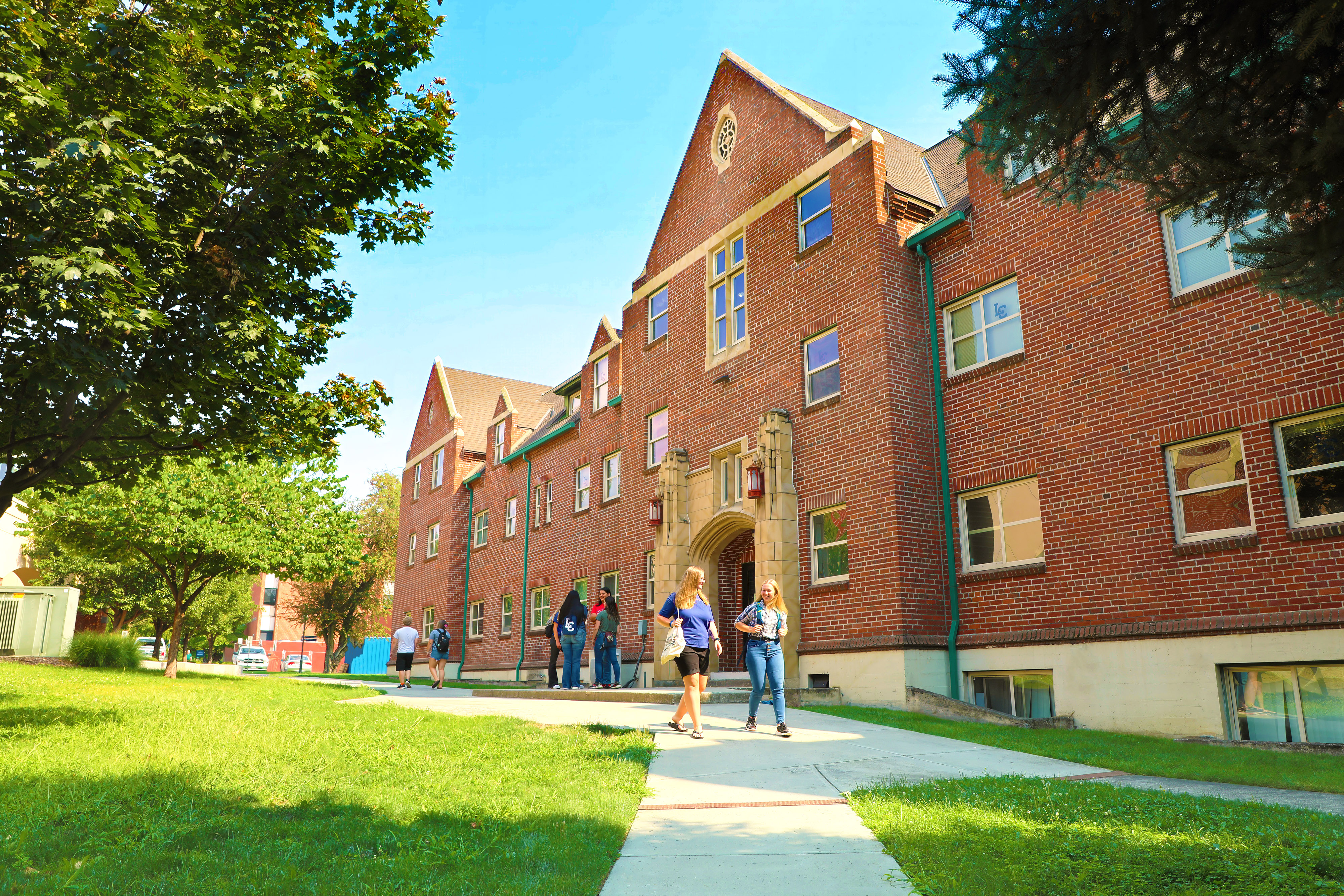 Students Walking In Front Of Talkington Hall