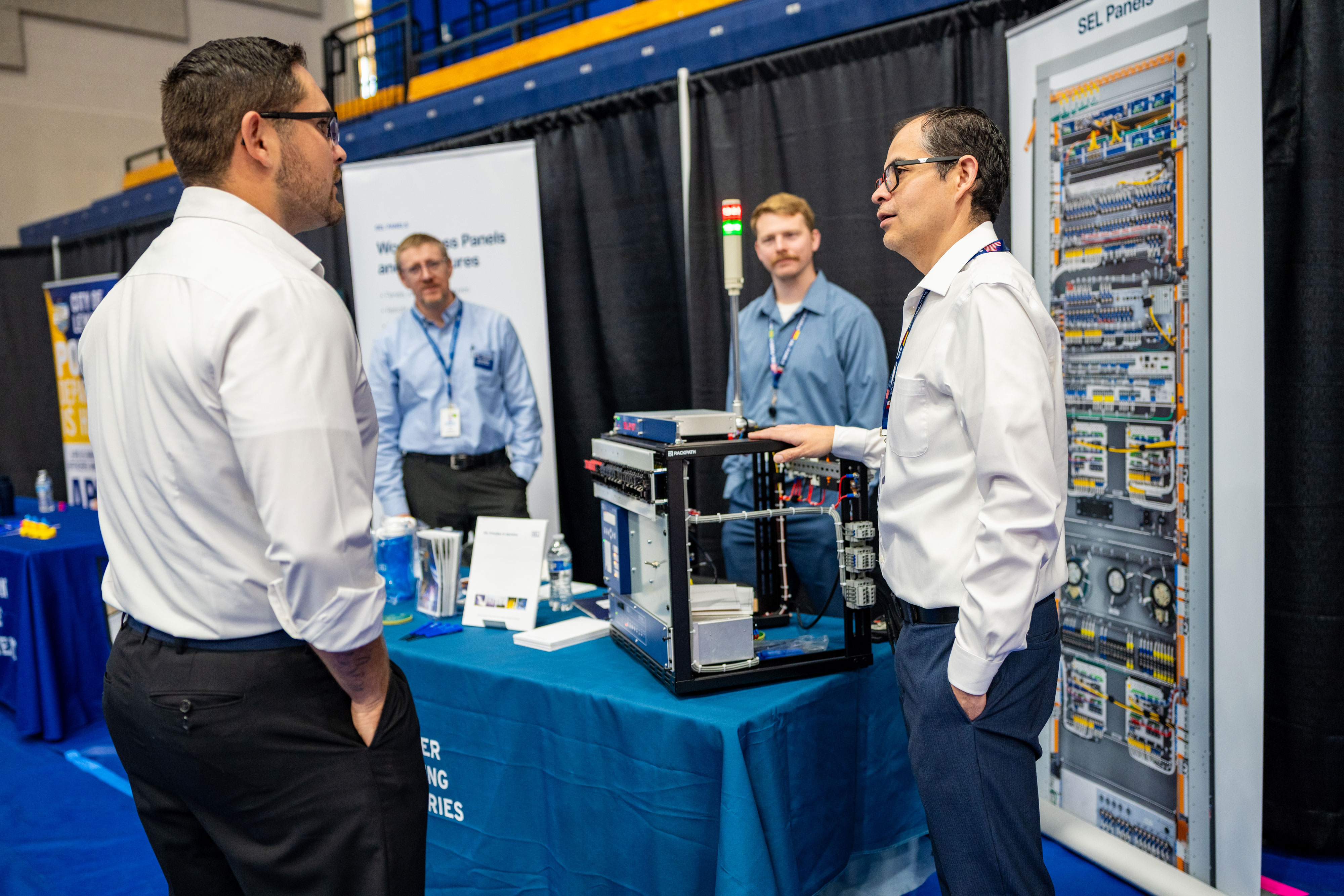 Student talking to a booth at the LC State Career Fair