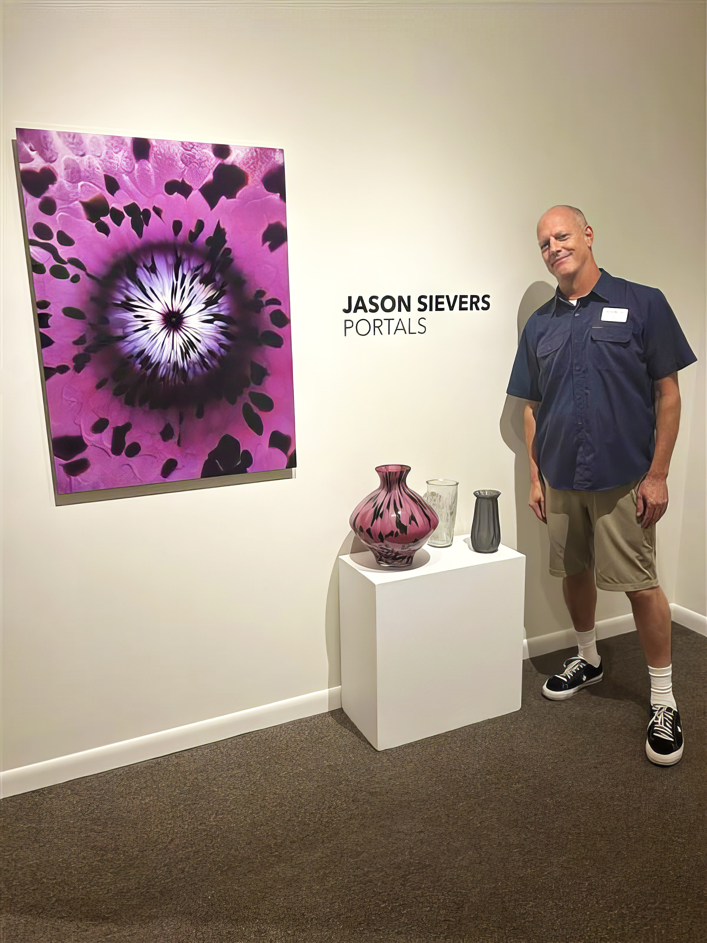 Artist Jason Sievers with exhibit titled Portals