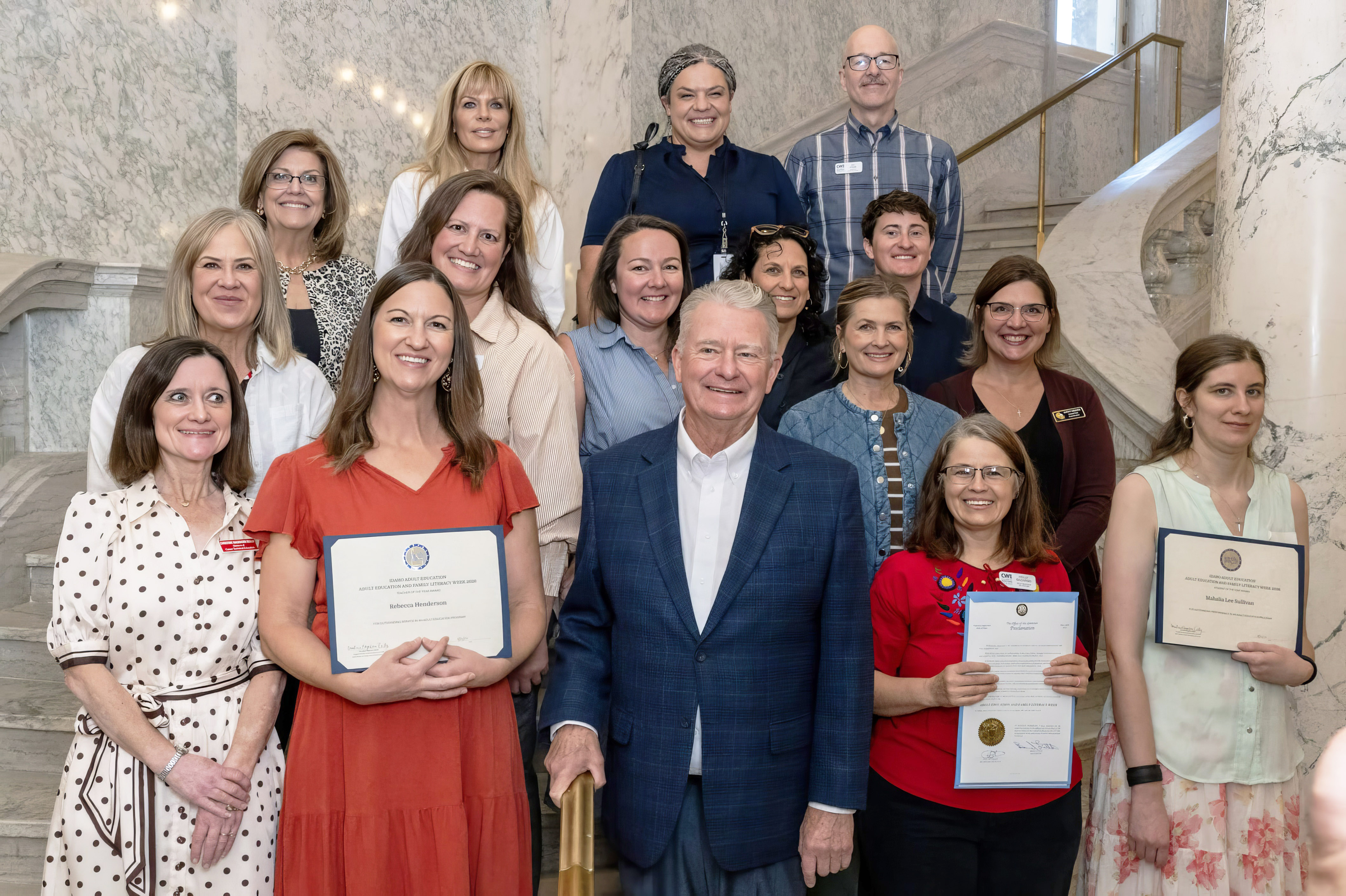Adult Education Student of the Year Mahalia Sullivan poses with Gov. Brad Little and others