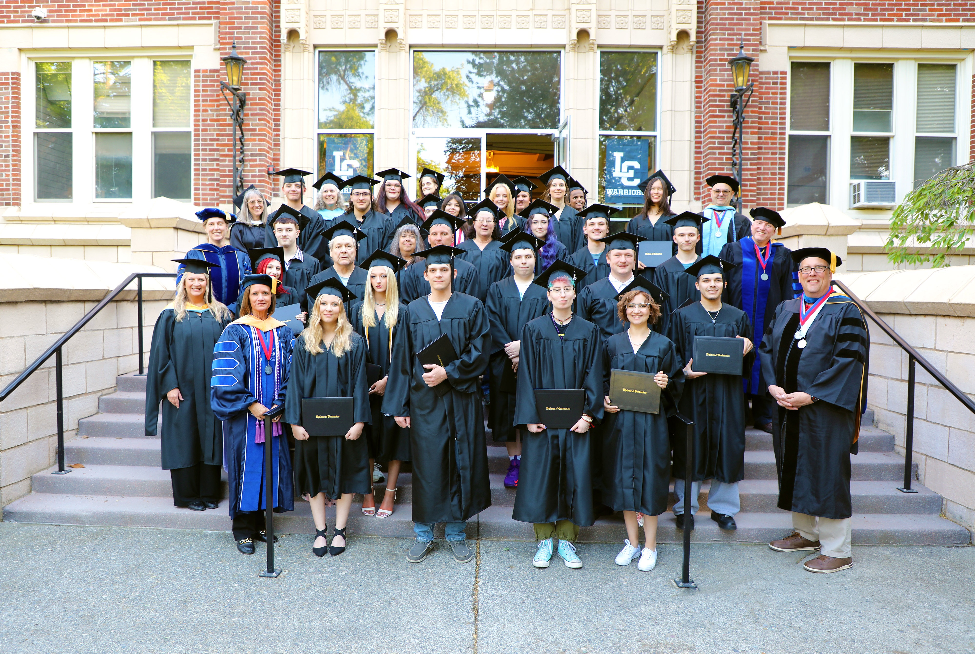The 2026 GED graduates pose for a group photo on the Lewis-Clark State College campus.