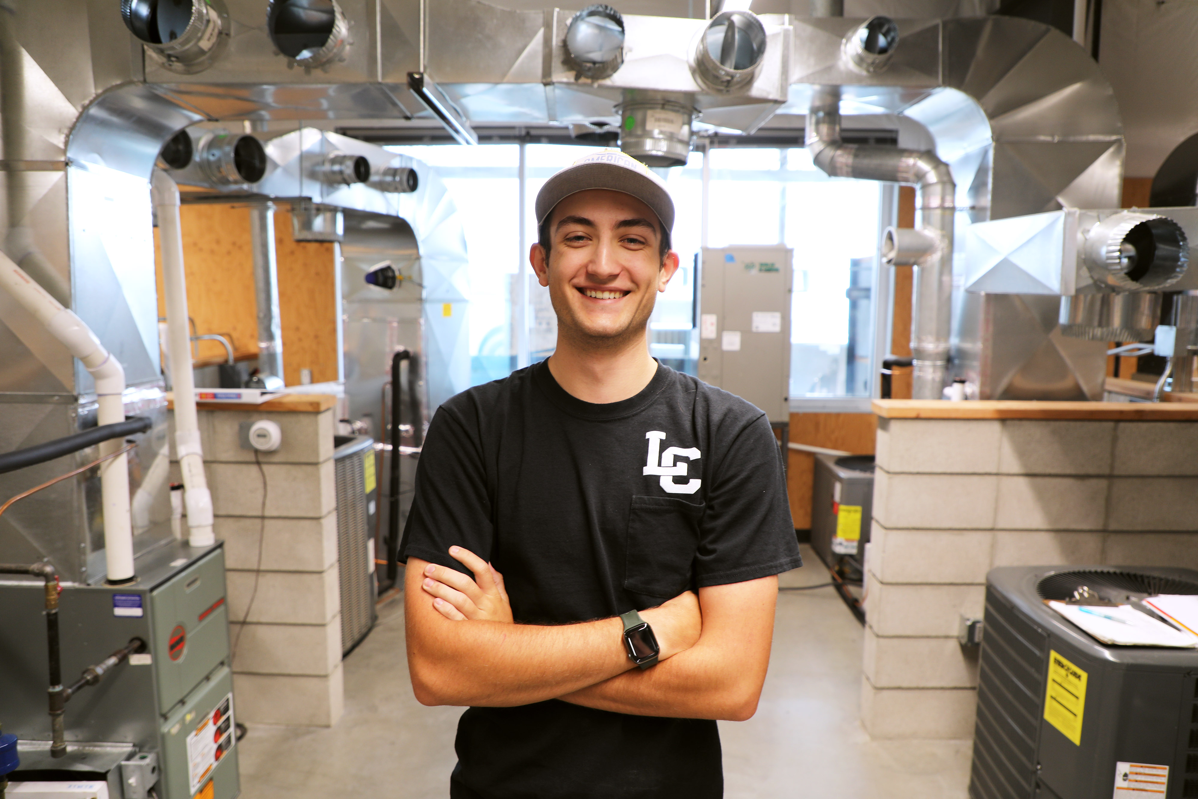 LC State Student Kyler Peterson Poses in HVACR Lab